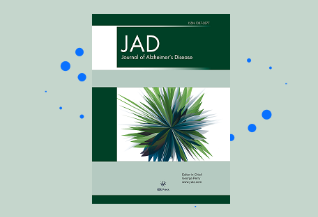 green JAD cover on a pale green background with blue dots behind the cover