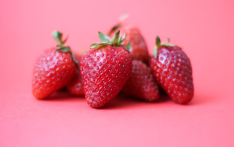 strawberries on a pink background