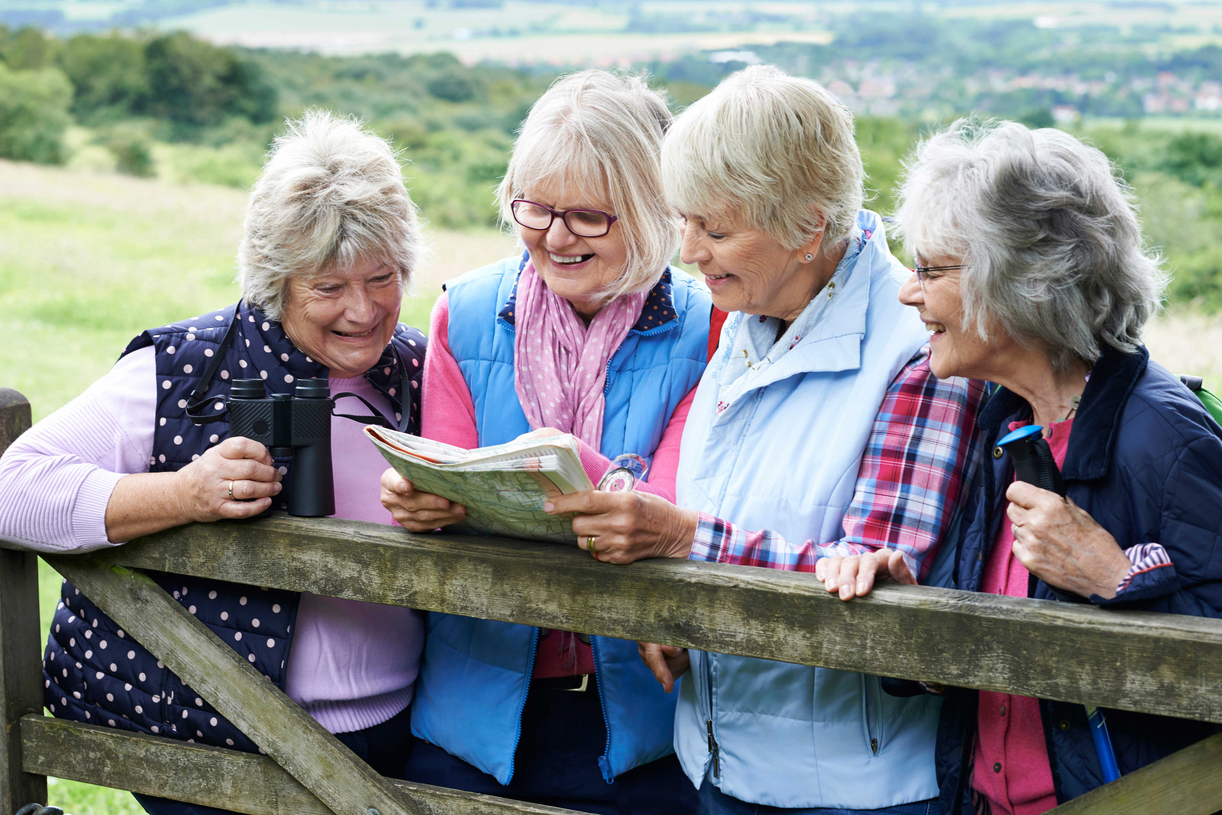 JAD_4 elderly women outside looking at map