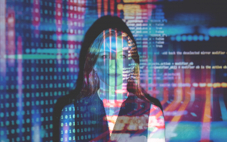 woman with digital projection in vibrant hues